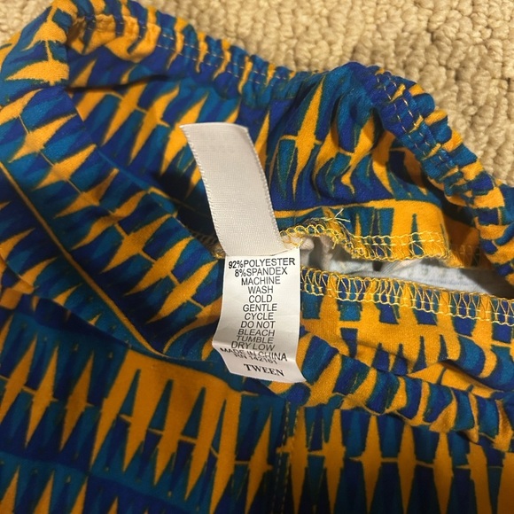 NWOT LuLaRoe Tween Size Stylish Kids' Blue and Yellow Patterned Leggings - Picture 2 of 5